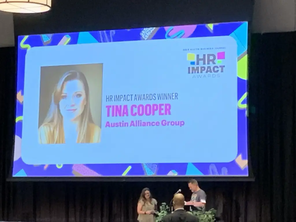 Tina Cooper named 2026 ABJ HR Impact Awards Winner on stage